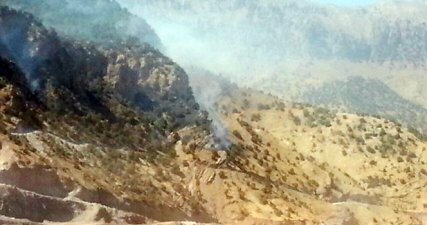 PKK'lılar Cudi Dağı'nda iş makinesini ateşe verdi